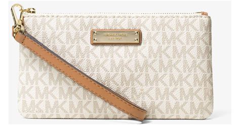 michael kors signature jet set medium wristlet|Michael Kors jet setter.